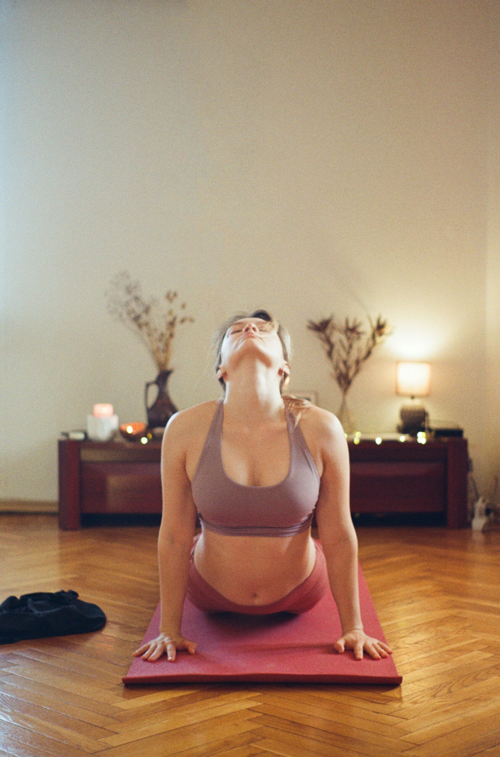 Woman practicing gentle breathing to calm nervous system dysregulation and restore balance.