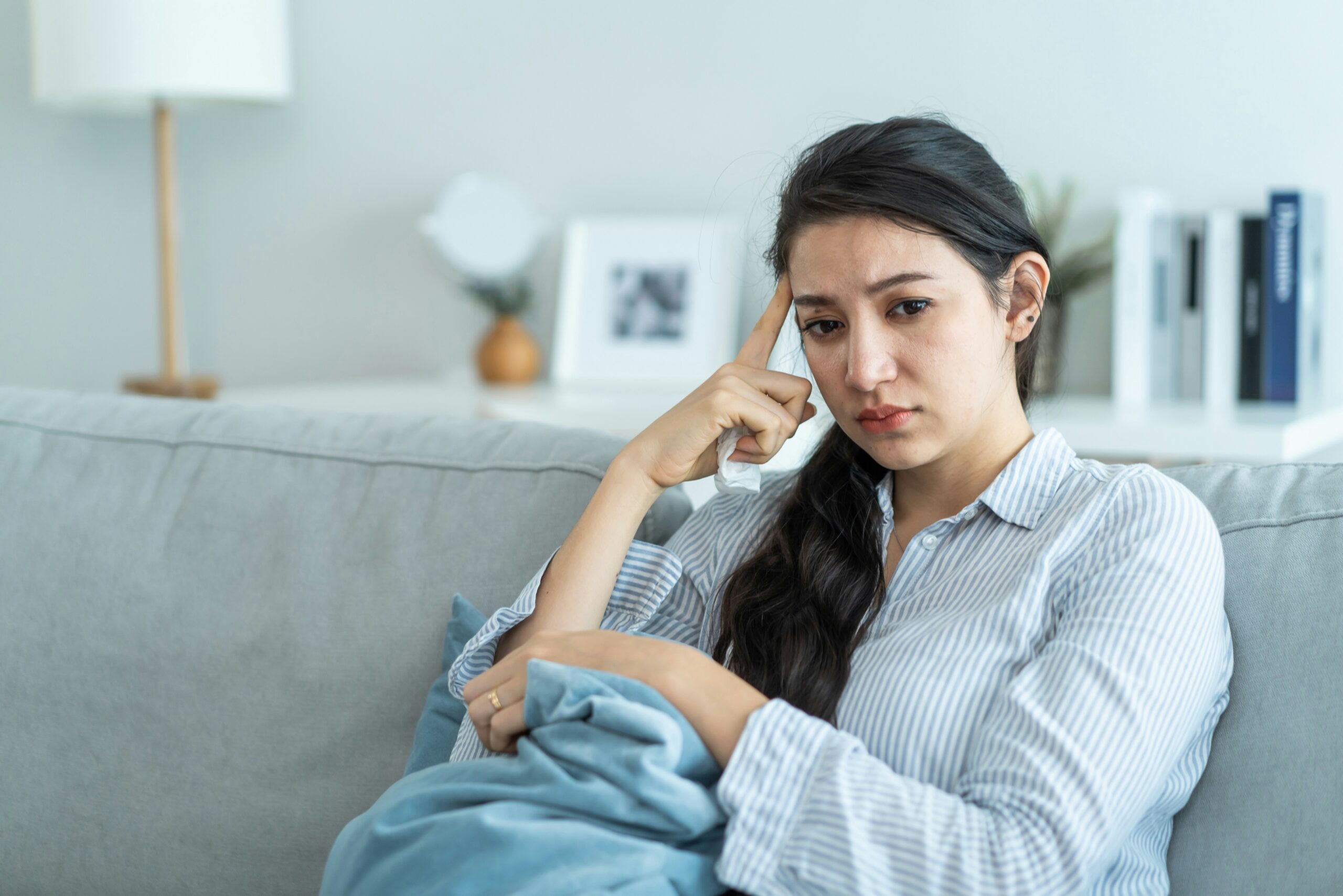 Woman wondering why she feels anxious for no reason
